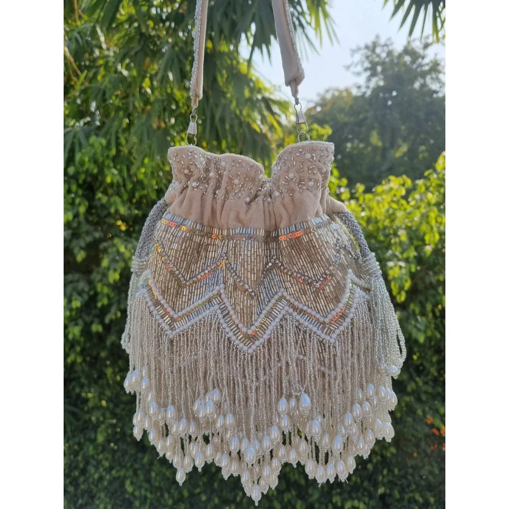 A Clutch Story Beige Pearl Tassel Potli