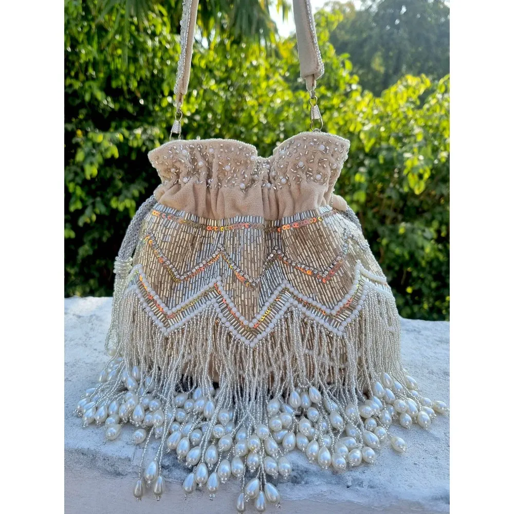 A Clutch Story Beige Pearl Tassel Potli